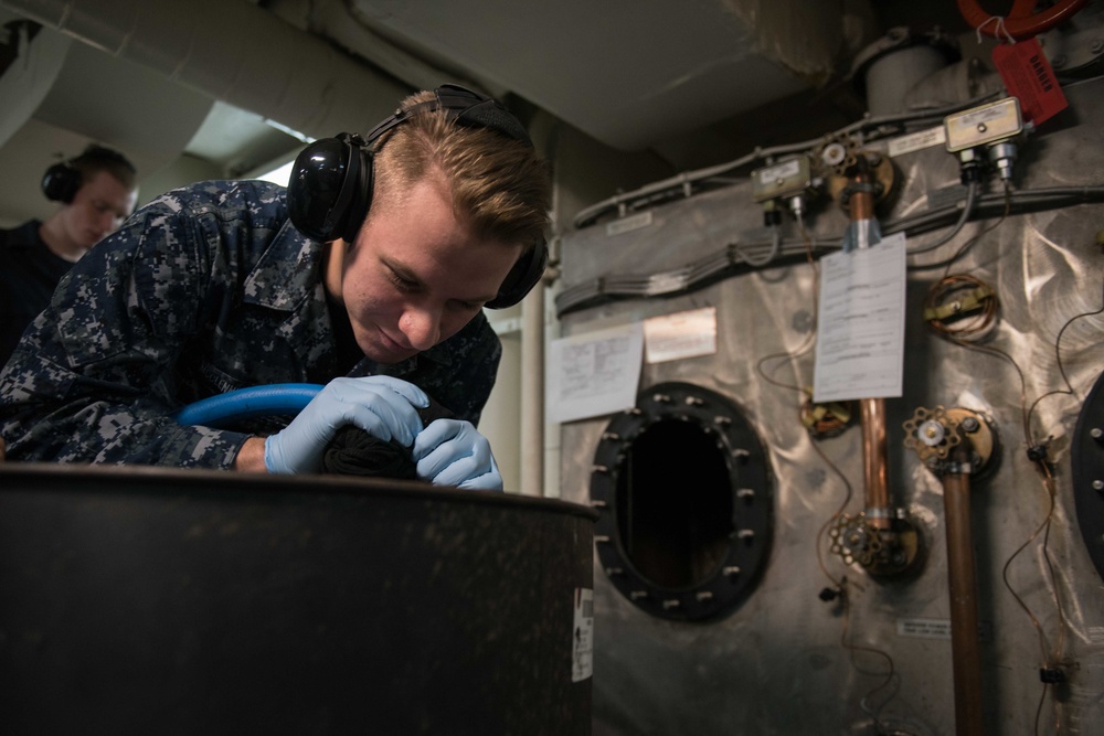Sailor drains a hydralic reserve tank
