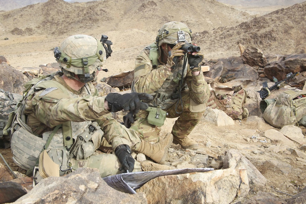U.S. Soldiers, 1st Lt. Darron Sandifer and Spc. Jeff Smith scan for simulated enemies