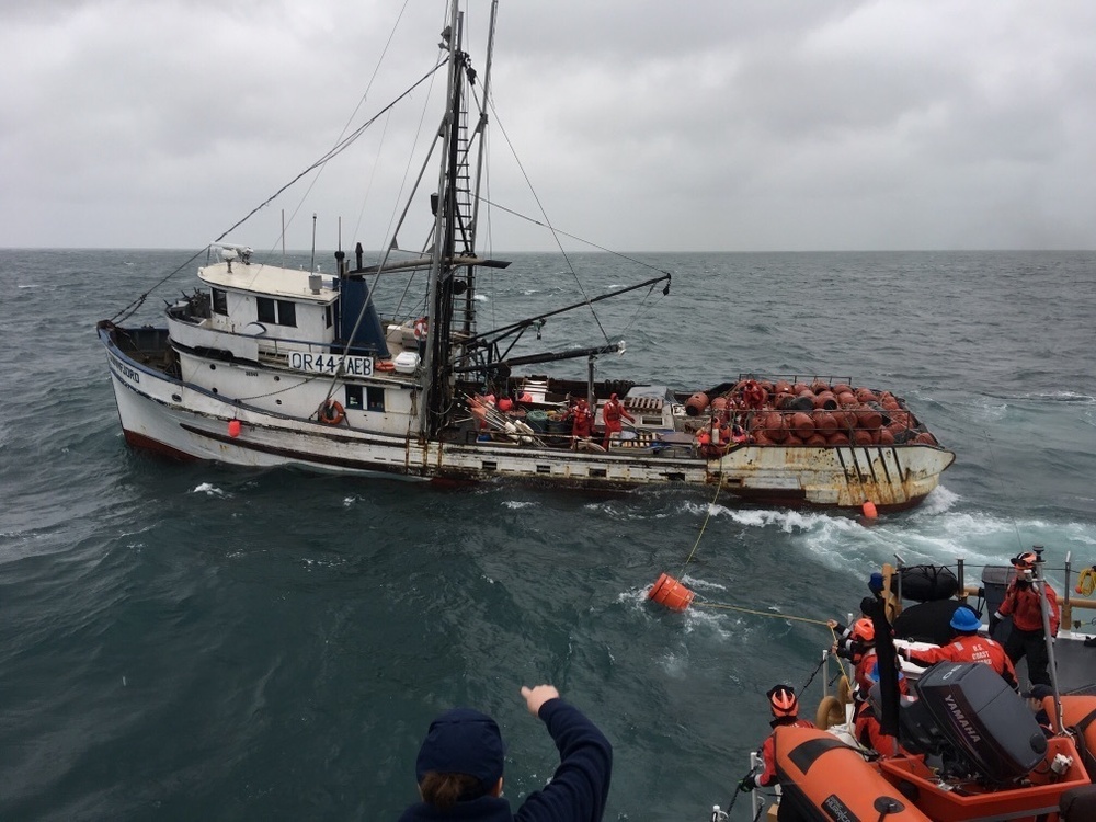 Coast Guard rescues 5 fishermen from flooding ship