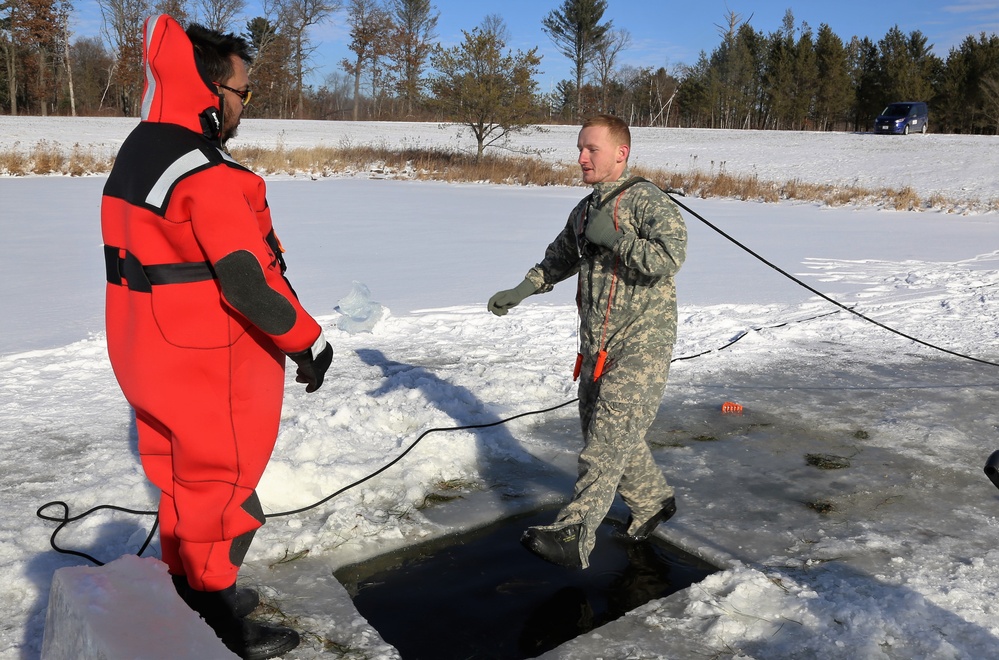 Cold-Weather Operations Course students battle icy conditions in cold-water immersion training at Fort McCoy