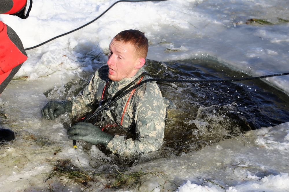 Cold-Weather Operations Course students battle icy conditions in cold-water immersion training at Fort McCoy