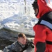 Cold-Weather Operations Course students battle icy conditions in cold-water immersion training at Fort McCoy