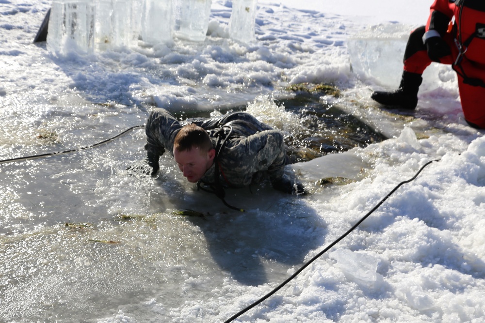 Cold-Weather Operations Course students battle icy conditions in cold-water immersion training at Fort McCoy