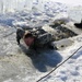 Cold-Weather Operations Course students battle icy conditions in cold-water immersion training at Fort McCoy