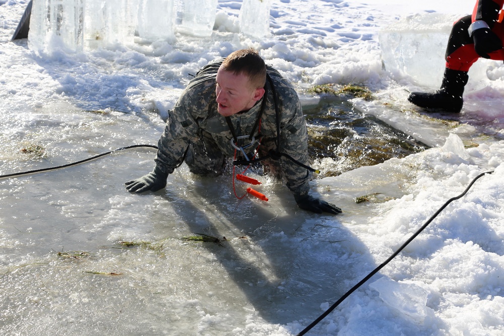 Cold-Weather Operations Course students battle icy conditions in cold-water immersion training at Fort McCoy