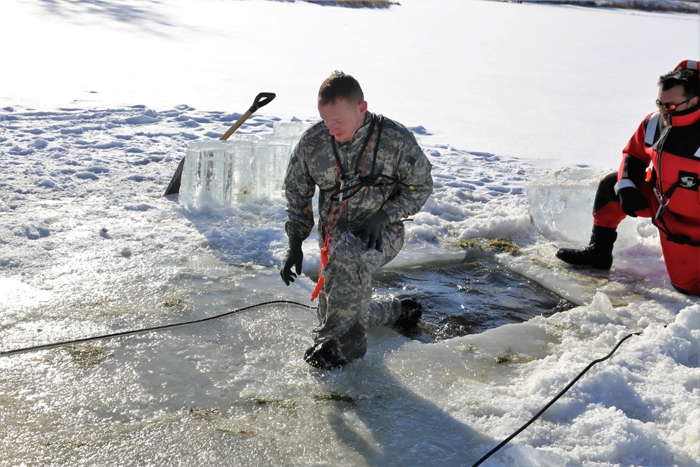 Cold-Weather Operations Course students battle icy conditions in cold-water immersion training at Fort McCoy