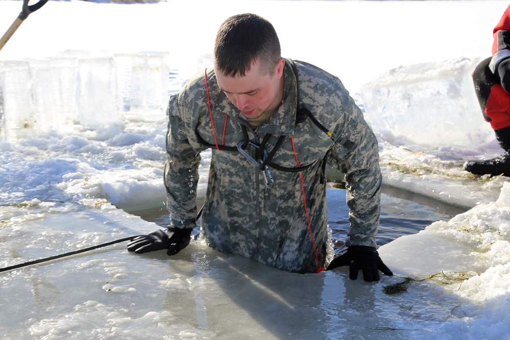 Cold-Weather Operations Course students battle icy conditions in cold-water immersion training at Fort McCoy