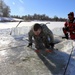 Cold-Weather Operations Course students battle icy conditions in cold-water immersion training at Fort McCoy