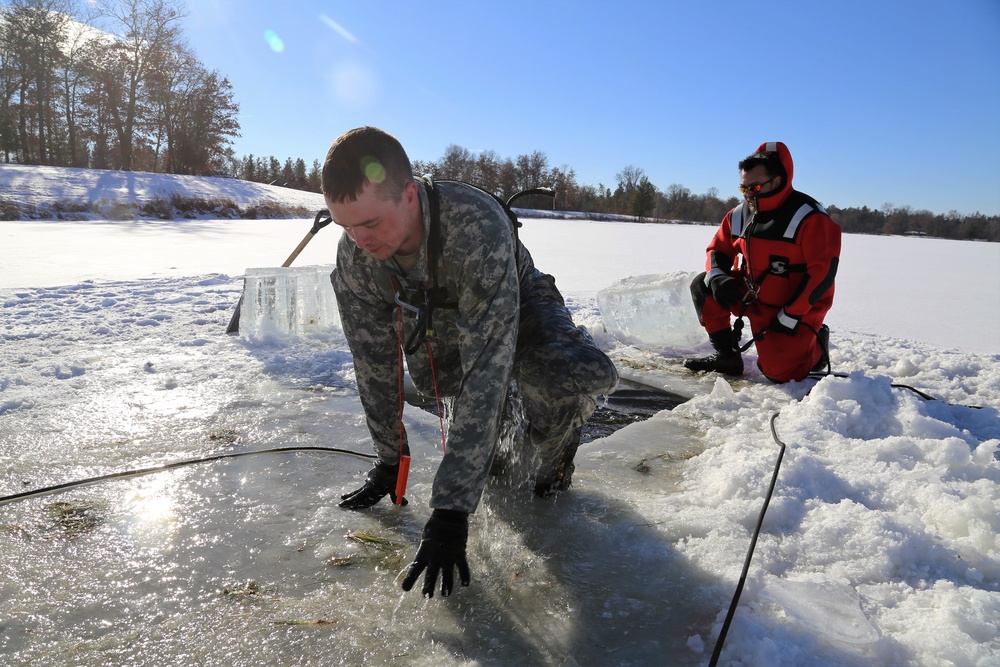 Cold-Weather Operations Course students battle icy conditions in cold-water immersion training at Fort McCoy