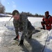 Cold-Weather Operations Course students battle icy conditions in cold-water immersion training at Fort McCoy