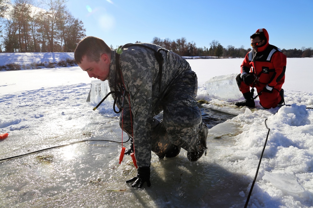 Cold-Weather Operations Course students battle icy conditions in cold-water immersion training at Fort McCoy