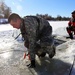 Cold-Weather Operations Course students battle icy conditions in cold-water immersion training at Fort McCoy