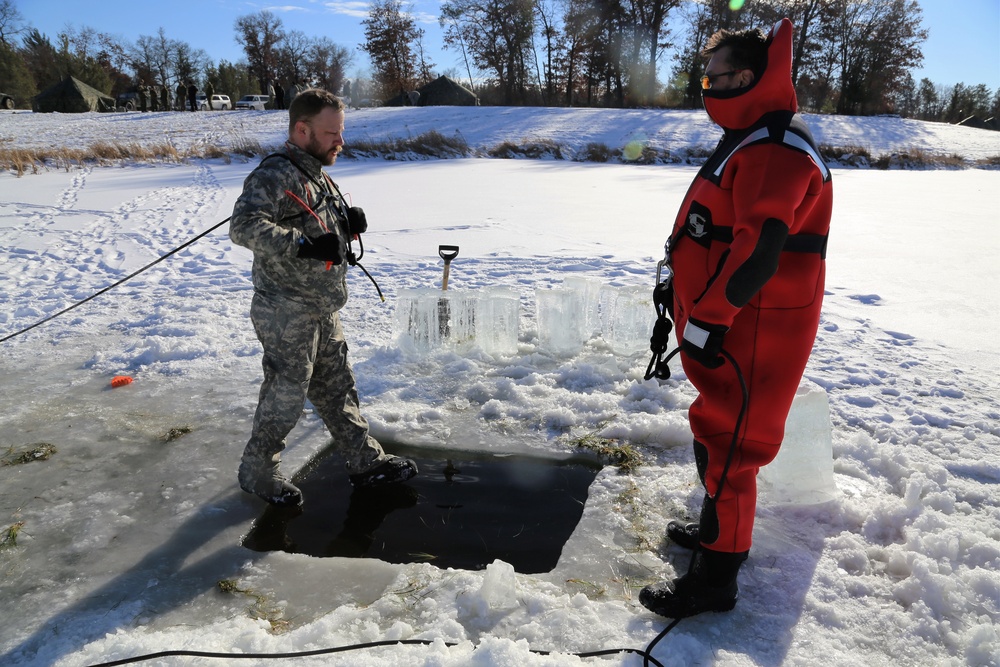 Cold-Weather Operations Course students battle icy conditions in cold-water immersion training at Fort McCoy