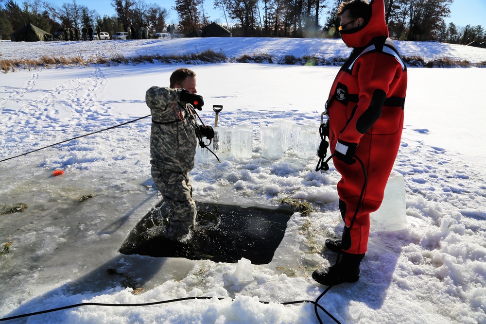 Cold-Weather Operations Course students battle icy conditions in cold-water immersion training at Fort McCoy