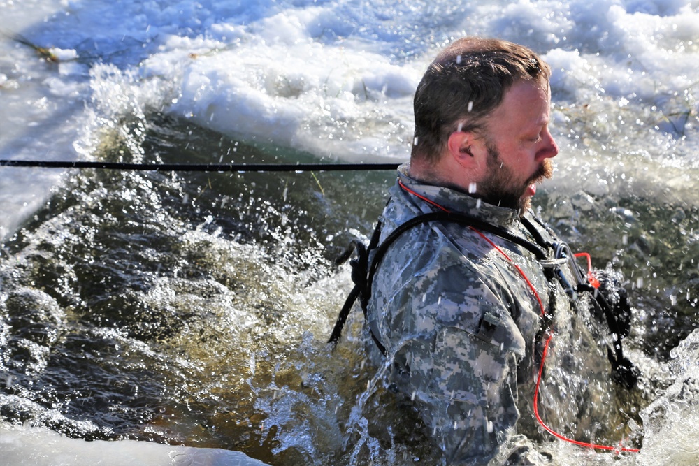 Cold-Weather Operations Course students battle icy conditions in cold-water immersion training at Fort McCoy