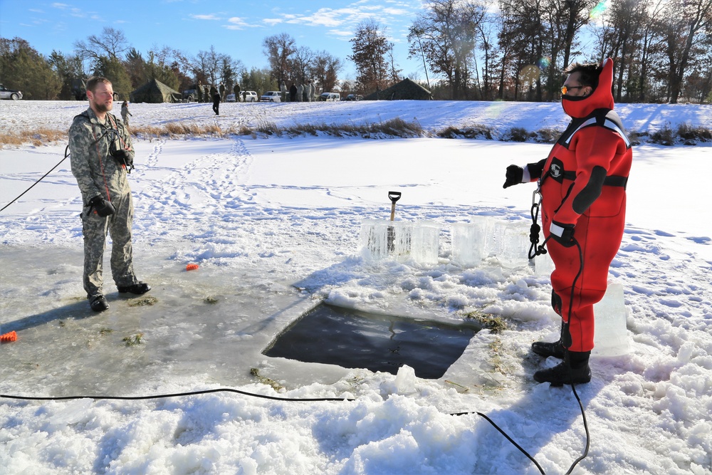 Cold-Weather Operations Course students battle icy conditions in cold-water immersion training at Fort McCoy