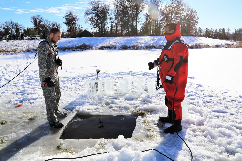 Cold-Weather Operations Course students battle icy conditions in cold-water immersion training at Fort McCoy