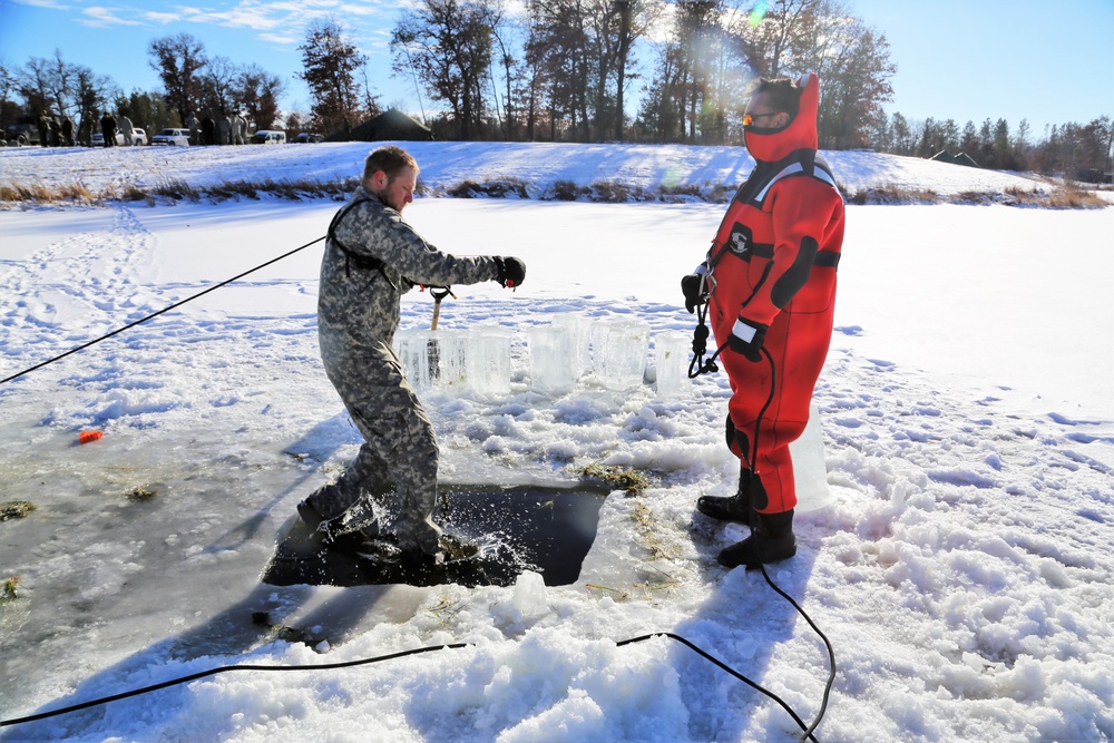 Cold-Weather Operations Course students battle icy conditions in cold-water immersion training at Fort McCoy