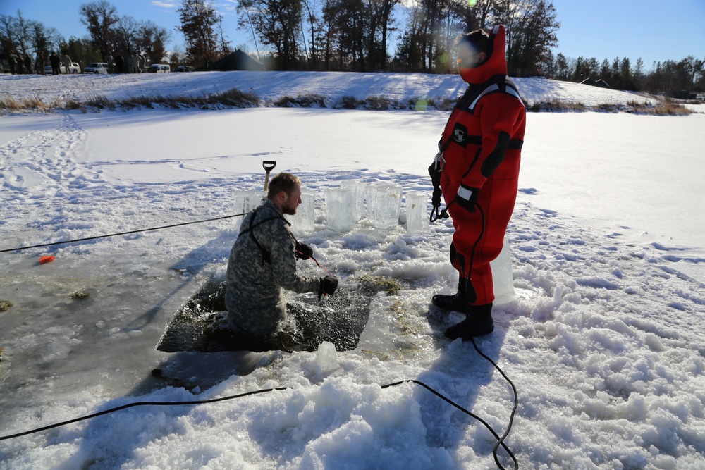 Cold-Weather Operations Course students battle icy conditions in cold-water immersion training at Fort McCoy