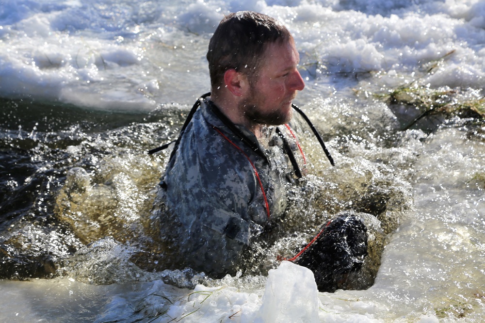 Cold-Weather Operations Course students battle icy conditions in cold-water immersion training at Fort McCoy