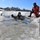 Cold-Weather Operations Course students battle icy conditions in cold-water immersion training at Fort McCoy