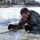 Cold-Weather Operations Course students battle icy conditions in cold-water immersion training at Fort McCoy