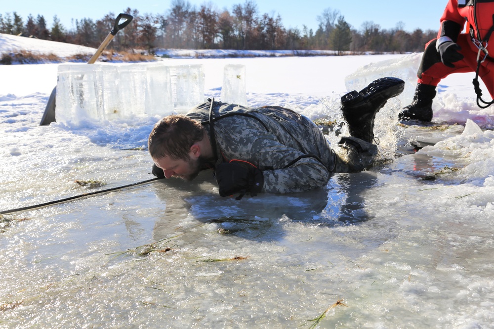 Cold-Weather Operations Course students battle icy conditions in cold-water immersion training at Fort McCoy