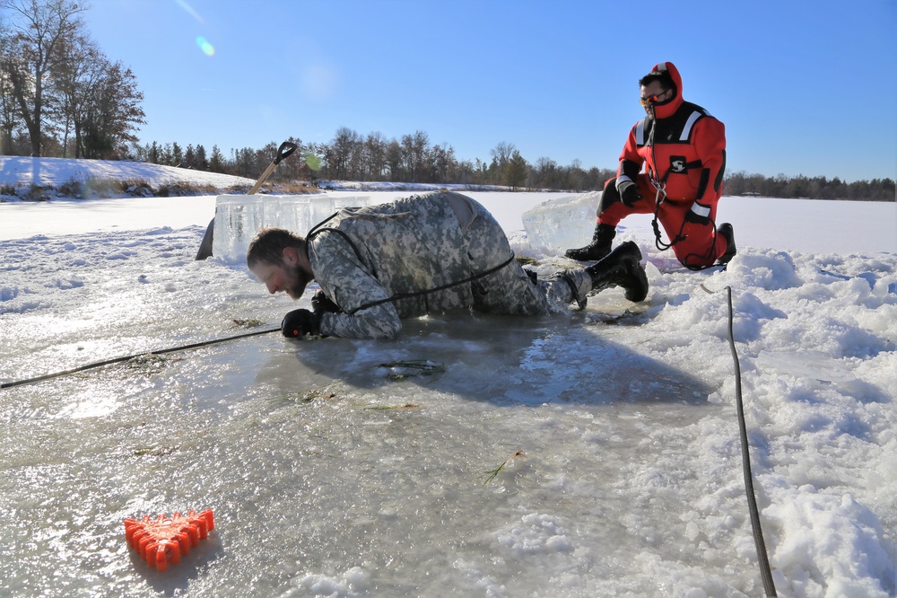 Cold-Weather Operations Course students battle icy conditions in cold-water immersion training at Fort McCoy