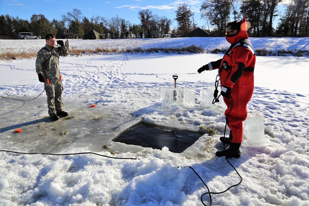 Cold-Weather Operations Course students battle icy conditions in cold-water immersion training at Fort McCoy