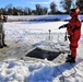 Cold-Weather Operations Course students battle icy conditions in cold-water immersion training at Fort McCoy