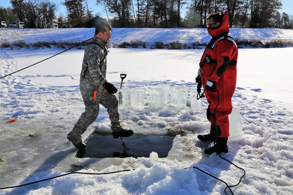 Cold-Weather Operations Course students battle icy conditions in cold-water immersion training at Fort McCoy