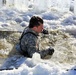 Cold-Weather Operations Course students battle icy conditions in cold-water immersion training at Fort McCoy