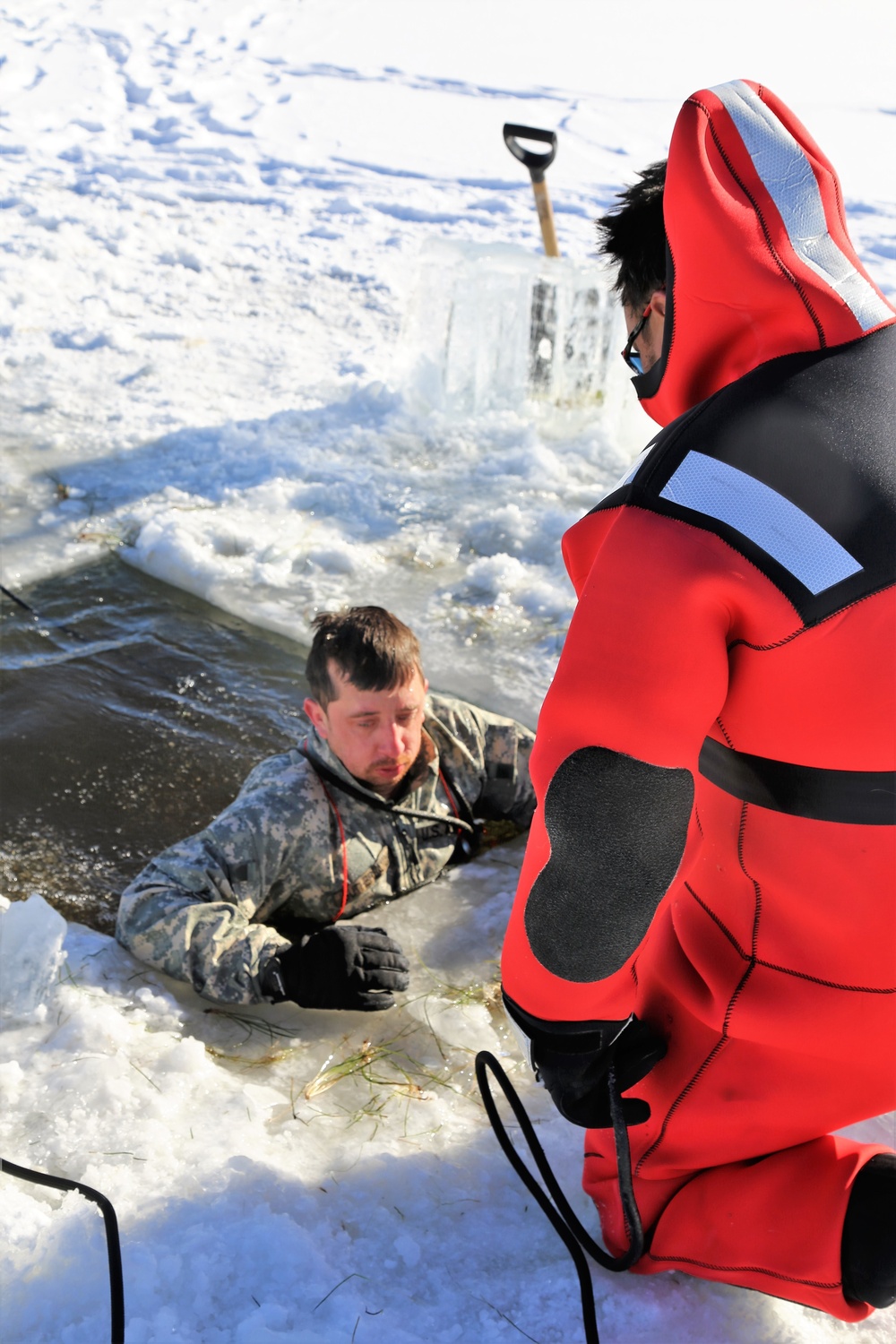 Cold-Weather Operations Course students battle icy conditions in cold-water immersion training at Fort McCoy