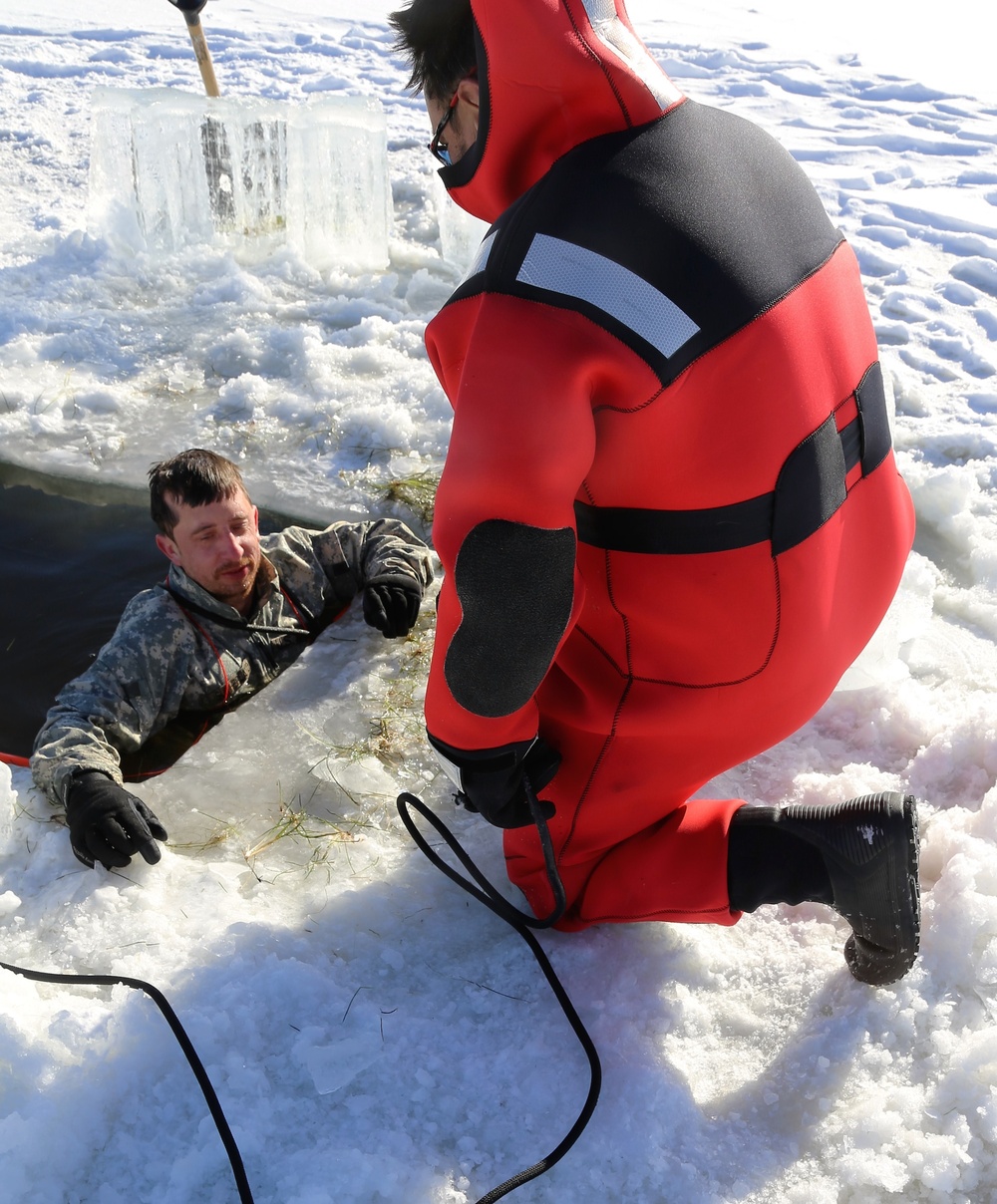 Cold-Weather Operations Course students battle icy conditions in cold-water immersion training at Fort McCoy