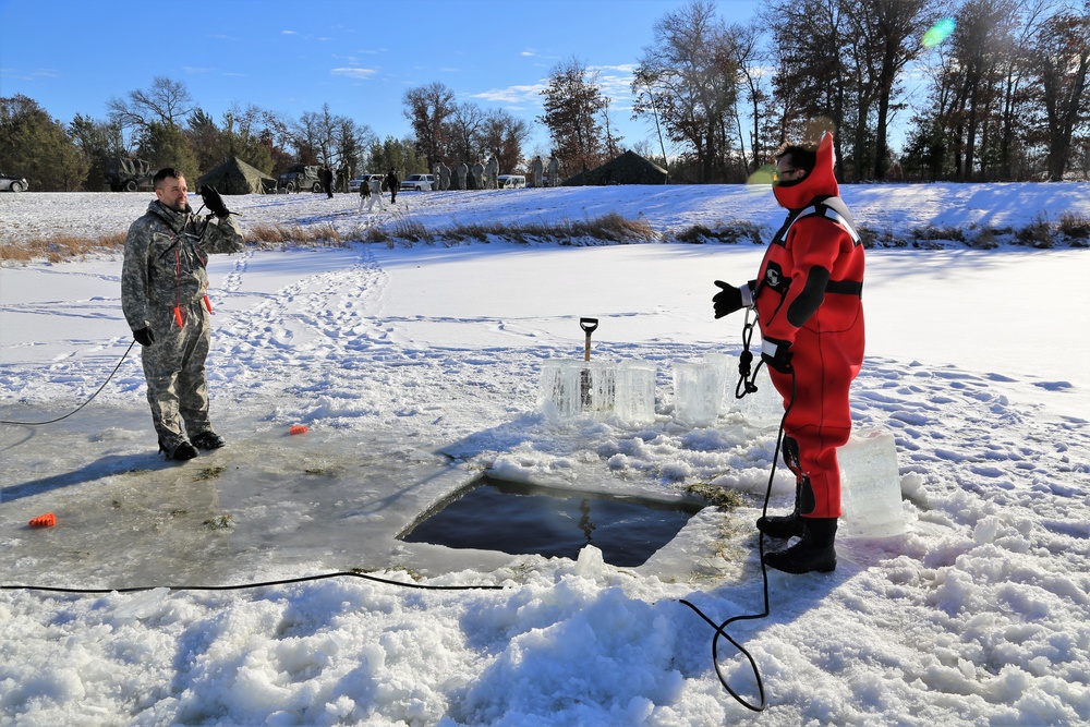 Cold-Weather Operations Course students battle icy conditions in cold-water immersion training at Fort McCoy