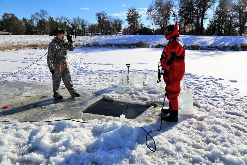 Cold-Weather Operations Course students battle icy conditions in cold-water immersion training at Fort McCoy