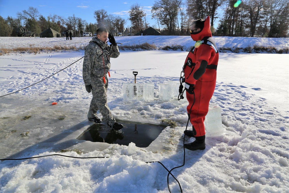 Cold-Weather Operations Course students battle icy conditions in cold-water immersion training at Fort McCoy