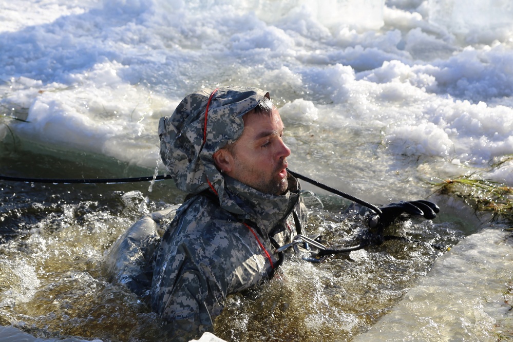 Cold-Weather Operations Course students battle icy conditions in cold-water immersion training at Fort McCoy