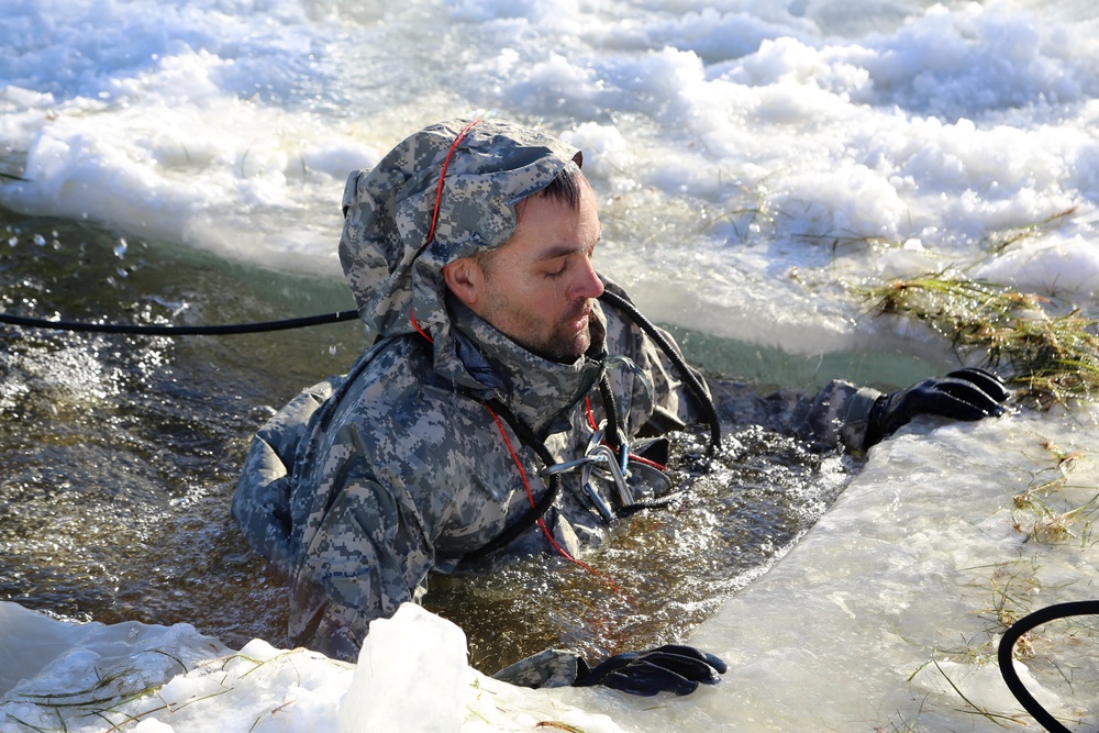 Cold-Weather Operations Course students battle icy conditions in cold-water immersion training at Fort McCoy