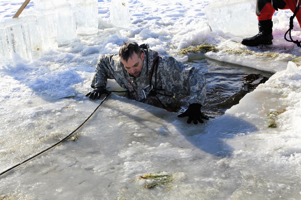 Cold-Weather Operations Course students battle icy conditions in cold-water immersion training at Fort McCoy