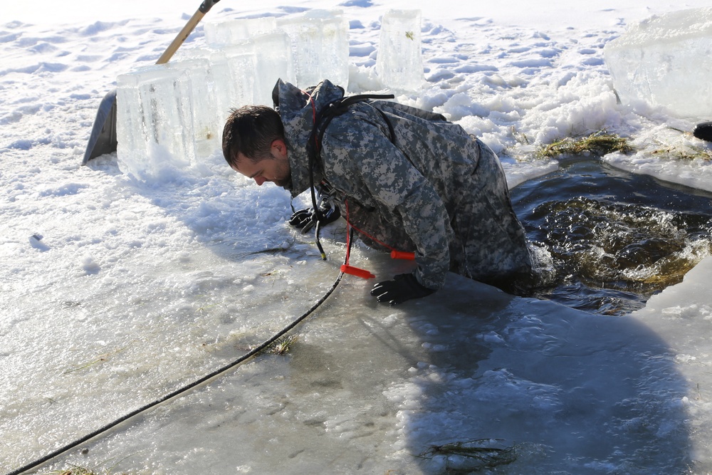 Cold-Weather Operations Course students battle icy conditions in cold-water immersion training at Fort McCoy