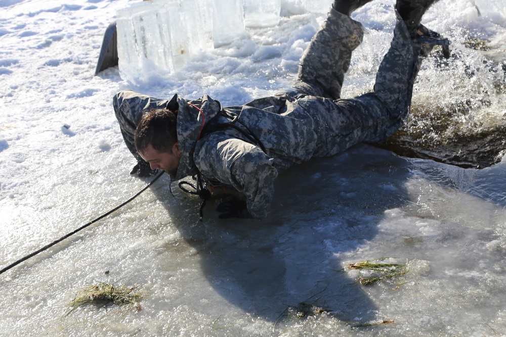 Cold-Weather Operations Course students battle icy conditions in cold-water immersion training at Fort McCoy