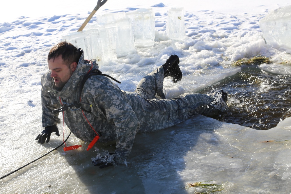 Cold-Weather Operations Course students battle icy conditions in cold-water immersion training at Fort McCoy