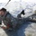 Cold-Weather Operations Course students battle icy conditions in cold-water immersion training at Fort McCoy