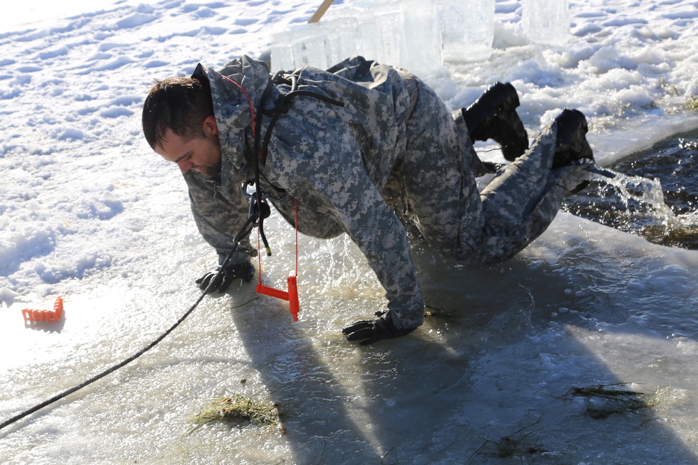 Cold-Weather Operations Course students battle icy conditions in cold-water immersion training at Fort McCoy