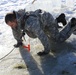 Cold-Weather Operations Course students battle icy conditions in cold-water immersion training at Fort McCoy