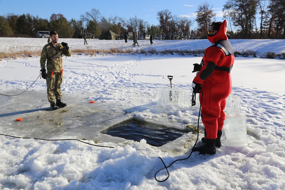 Cold-Weather Operations Course students battle icy conditions in cold-water immersion training at Fort McCoy