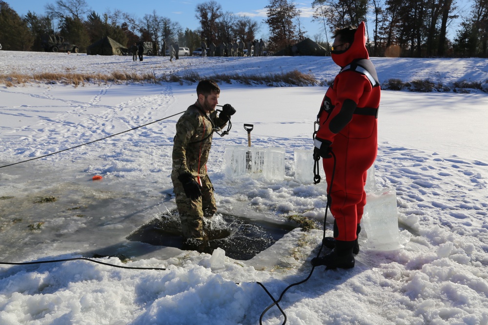 Cold-Weather Operations Course students battle icy conditions in cold-water immersion training at Fort McCoy