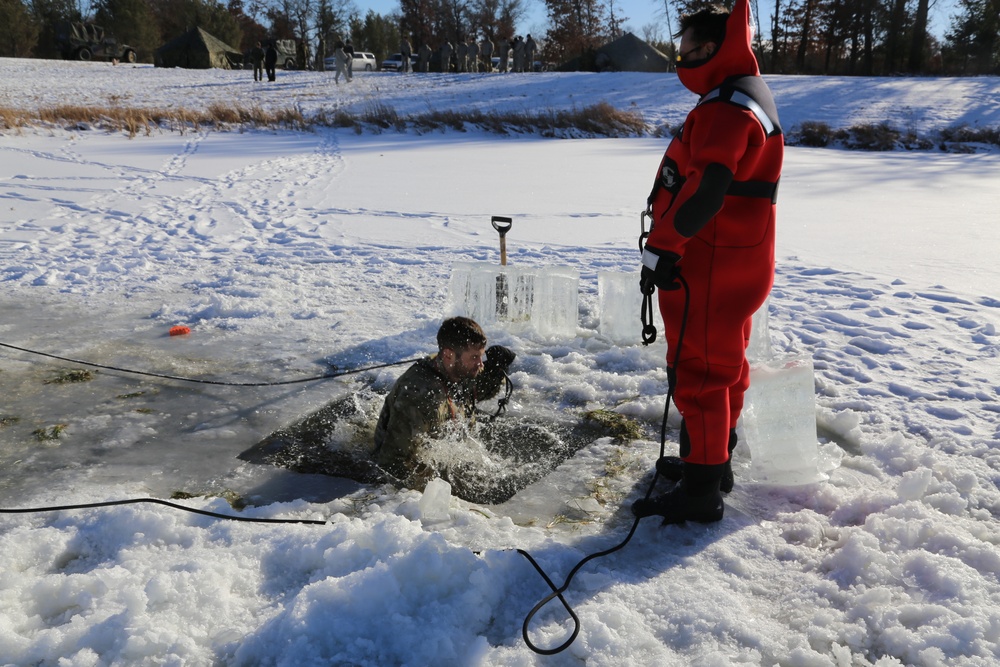 Cold-Weather Operations Course students battle icy conditions in cold-water immersion training at Fort McCoy