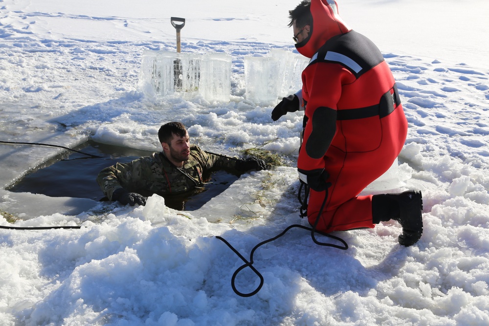 Cold-Weather Operations Course students battle icy conditions in cold-water immersion training at Fort McCoy